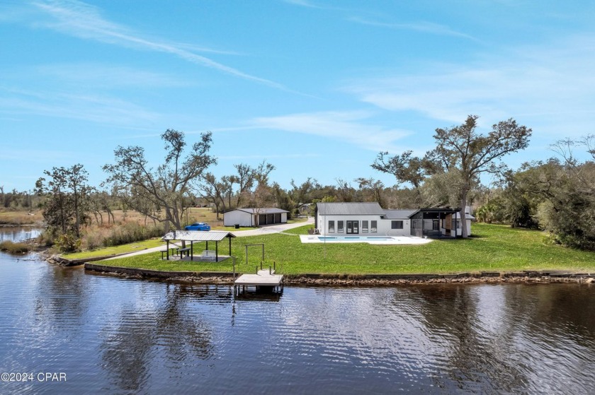 Welcome to your dream lakefront oasis! This completely remodeled - Beach Home for sale in Panama City, Florida on Beachhouse.com