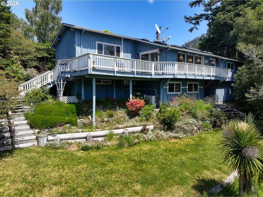 Main-Level Living with Bonus Space, Ocean Peeks & Exceptional - Beach Home for sale in Gold Beach, Oregon on Beachhouse.com