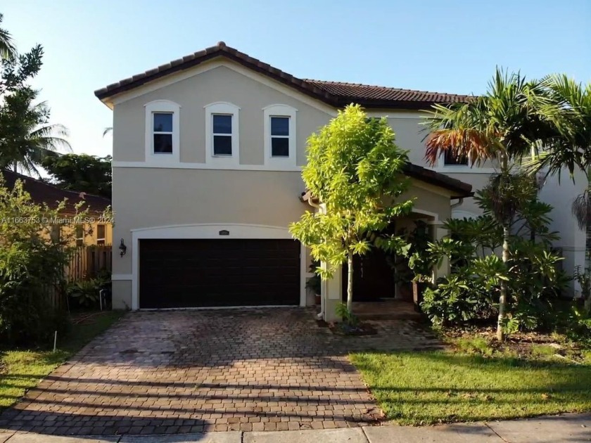 Welcome to this beautifully maintained Lake front two-story home - Beach Home for sale in Homestead, Florida on Beachhouse.com