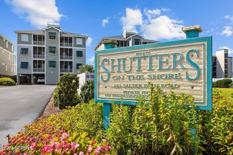 This gorgeous oceanfront condo in the highly sought after - yet - Beach Condo for sale in Pine Knoll Shores, North Carolina on Beachhouse.com