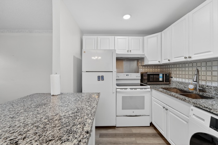 First-floor, updated, low-maintenance lifestyle + updated - Beach Condo for sale in West Palm Beach, Florida on Beachhouse.com