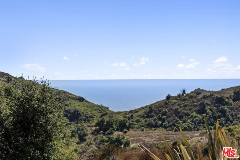 Nestled on approximately one acre of beautifully landscaped - Beach Home for sale in Malibu, California on Beachhouse.com