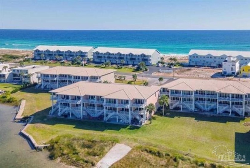 Welcome to coastal living at its finest! Perfectly situated - Beach Home for sale in Pensacola Beach, Florida on Beachhouse.com
