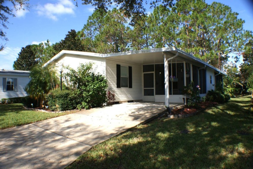 Spacious 3-bedroom 2 bathroom with tray ceilings in the living - Beach Home for sale in Ormond Beach, Florida on Beachhouse.com