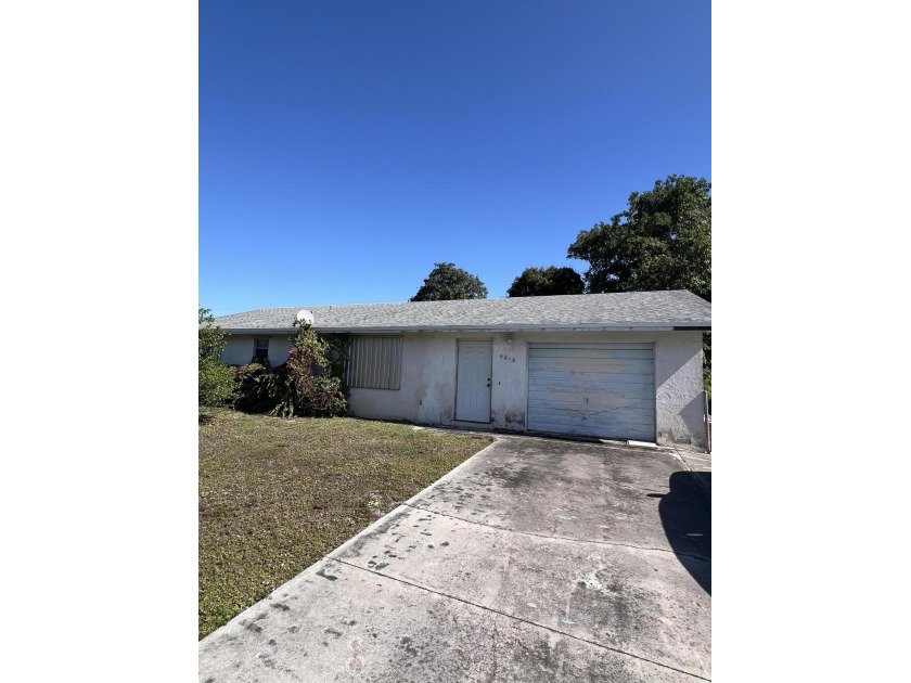 Welcome to this well-located 3-bedroom, 2-bath home offering - Beach Home for sale in Lake Worth, Florida on Beachhouse.com