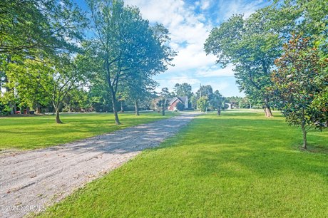 Nestled along the picturesque Pamlico River, this waterfront - Beach Home for sale in Blounts Creek, North Carolina on Beachhouse.com