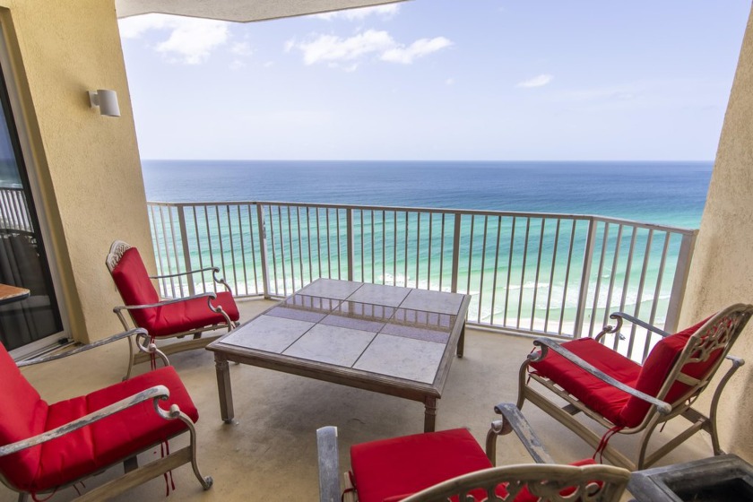 Located on a palm tree lined boulevard, Boardwalk Beach Resort - Beach Condo for sale in Panama City Beach, Florida on Beachhouse.com