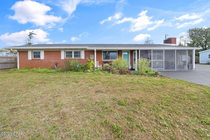 Captivating ranch-style residence featuring 4 bedrooms, 3 baths - Beach Home for sale in Panama City, Florida on Beachhouse.com