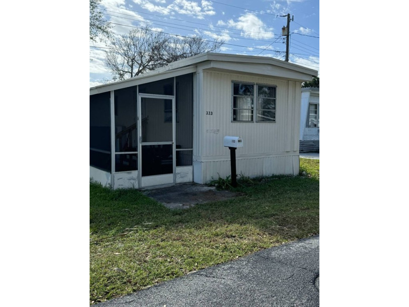 This two-bedroom, one-bathroom mobile home is located in the - Beach Home for sale in South Daytona, Florida on Beachhouse.com