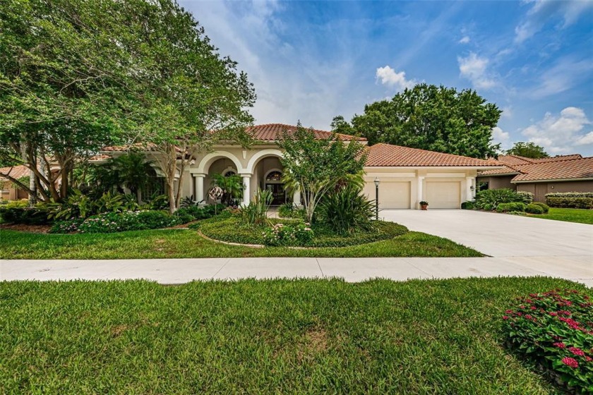 This Home has it All - located in the much sought-after Gated - Beach Home for sale in Oldsmar, Florida on Beachhouse.com