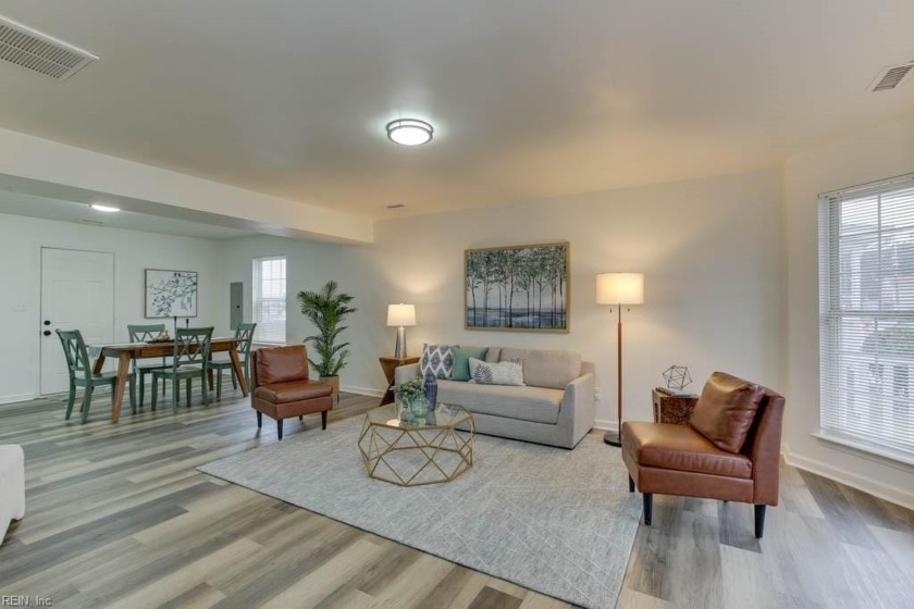 This charming home features a spacious open floor plan on the - Beach Home for sale in Norfolk, Virginia on Beachhouse.com