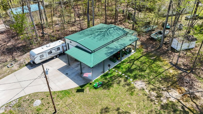 Check out this Lot with 30x40 Metal Building in Snug Harbor - Beach Lot for sale in Hertford, North Carolina on Beachhouse.com