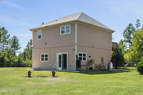 MOTIVATED SELLER!  Rural atmosphere at its best! This unique two - Beach Home for sale in Holly Ridge, North Carolina on Beachhouse.com