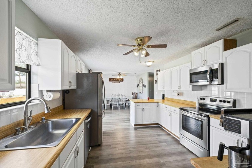Welcome to your dream home! Situated on a spacious .69-acre - Beach Home for sale in Navarre, Florida on Beachhouse.com