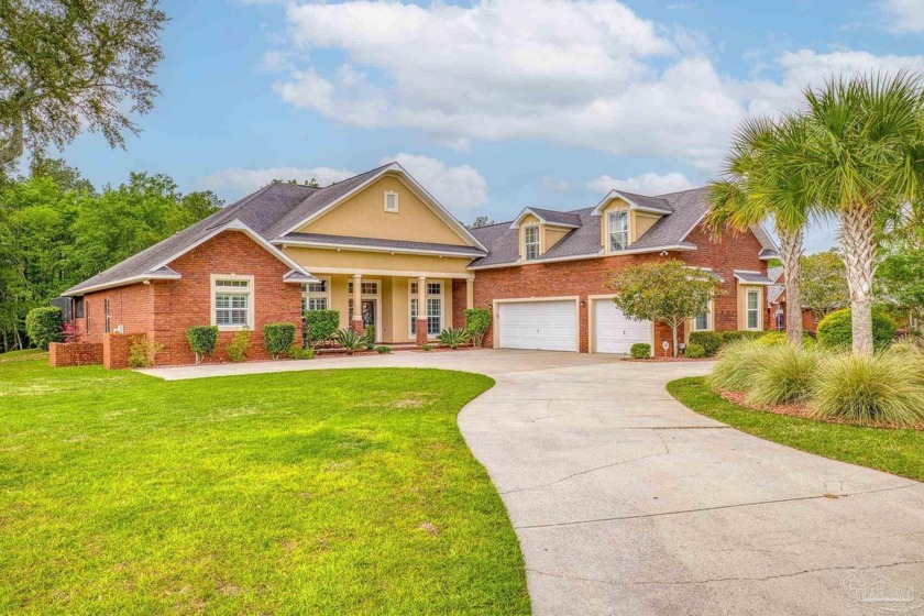 Discover your own private paradise in this stunning custom-built - Beach Home for sale in Pace, Florida on Beachhouse.com