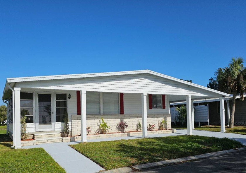 Step into this inviting 1,248 sq. ft. home, where comfort and - Beach Home for sale in Vero Beach, Florida on Beachhouse.com