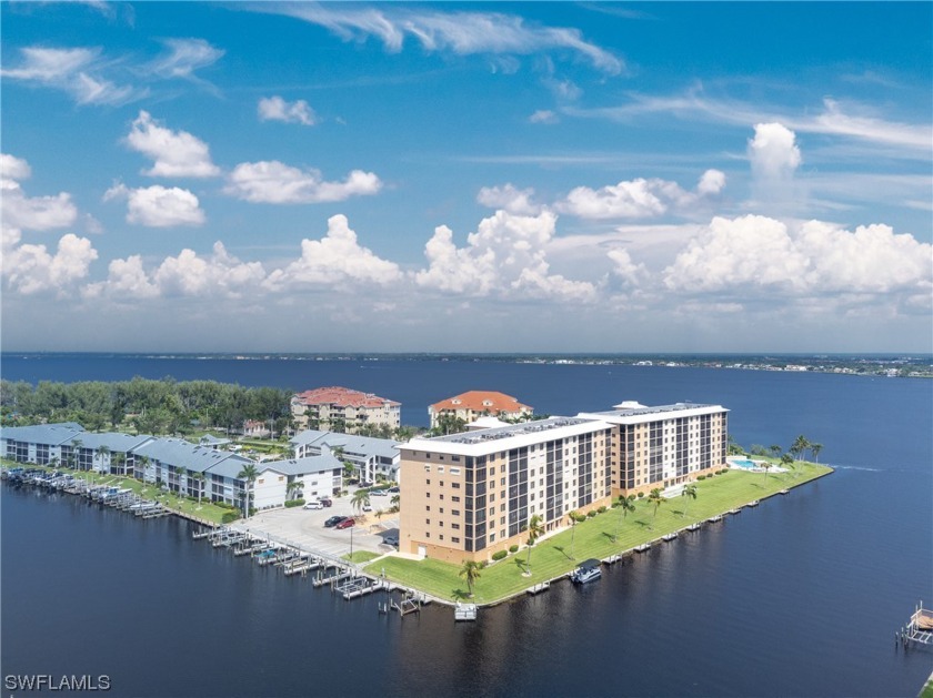 This 7th-floor end unit boasts captivating sunsets, expansive - Beach Condo for sale in Cape Coral, Florida on Beachhouse.com