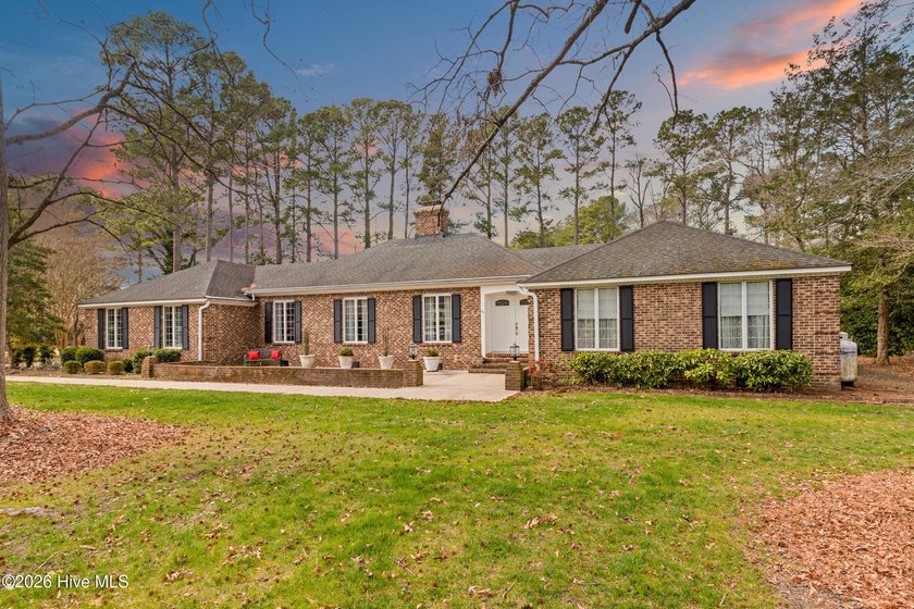 Gracefully set on a beautifully proportioned over 3/4 acre - Beach Home for sale in Elizabeth City, North Carolina on Beachhouse.com