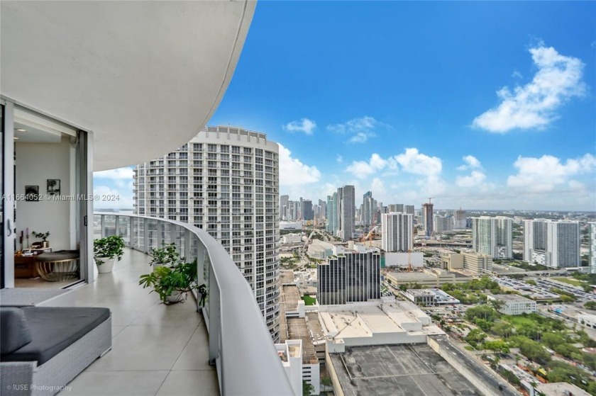 Experience luxury living in this stunning 2-bedroom, 2 - Beach Condo for sale in Miami, Florida on Beachhouse.com