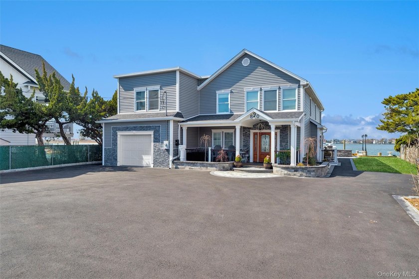 Set on a rare quarter-acre of prime open bay waterfront in - Beach Home for sale in Freeport, New York on Beachhouse.com