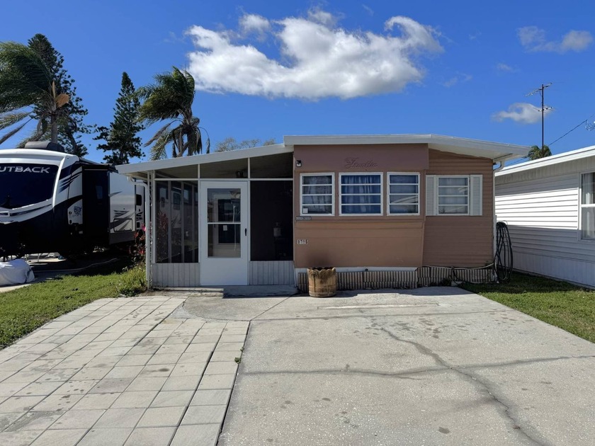 This 2 Bedroom, 1 Bath Home is in Holiday Travel Park, an All - Beach Home for sale in Holiday, Florida on Beachhouse.com