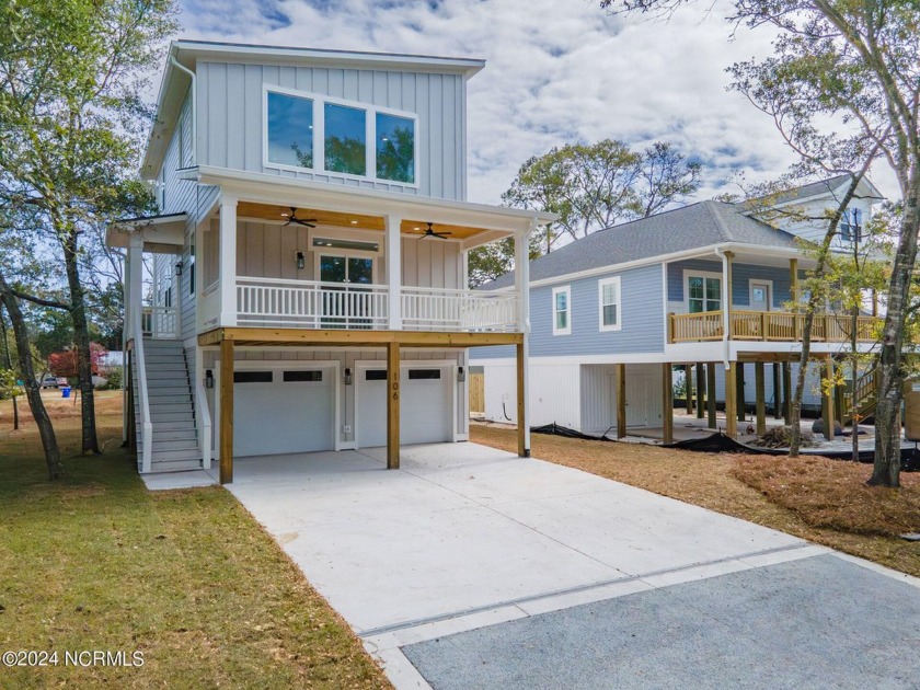 Welcome to 106 NW 22nd St, Oak Island, NC--a beautifully crafted - Beach Home for sale in Oak Island, North Carolina on Beachhouse.com