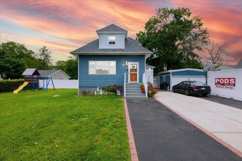 This charming two-story Cape Cod family home features three - Beach Home for sale in West Babylon, New York on Beachhouse.com