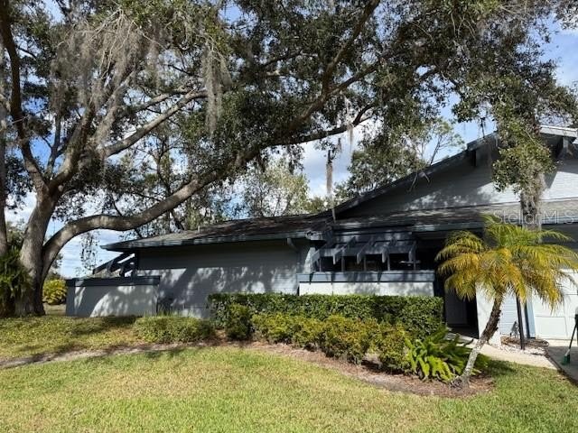 VERY DESIRABLE GATED COMMUNITY OF EAST LAKE WOODLANDS, CORNER - Beach Home for sale in Oldsmar, Florida on Beachhouse.com