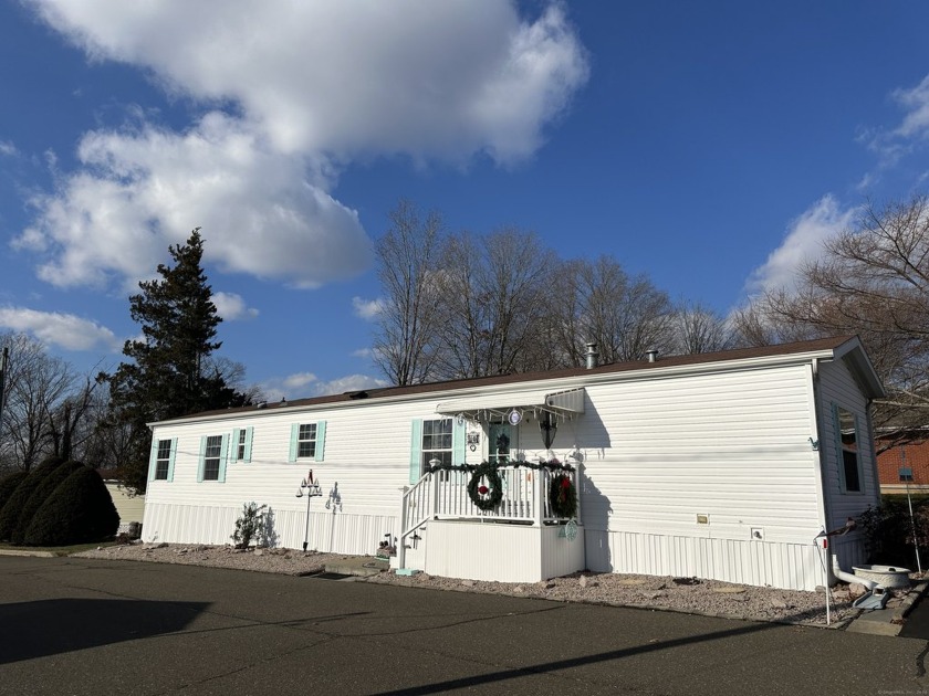 An opportunity for affordable living in this modern Titan - Beach Home for sale in Branford, Connecticut on Beachhouse.com