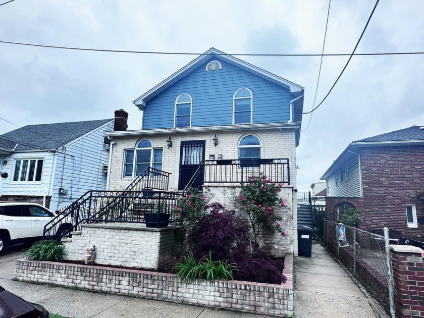 Welcome to this exceptional 2-family residence that perfectly - Beach Townhome/Townhouse for sale in Howard Beach, New York on Beachhouse.com