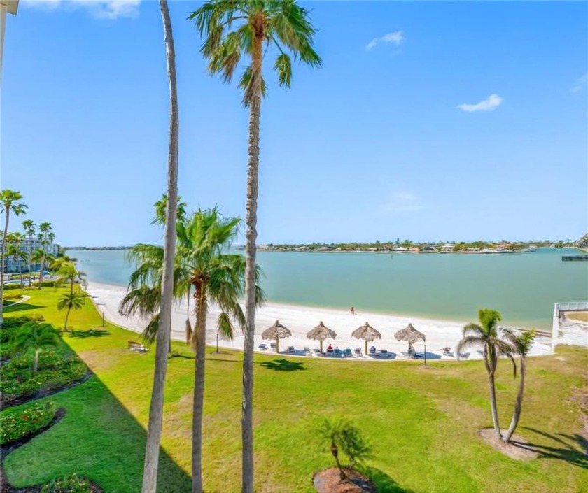 Stunning end unit offering water views galore!  This turnkey - Beach Condo for sale in St. Petersburg, Florida on Beachhouse.com