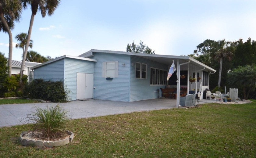 Nestled on a private end lot with beautiful nature views and - Beach Home for sale in Titusville, Florida on Beachhouse.com