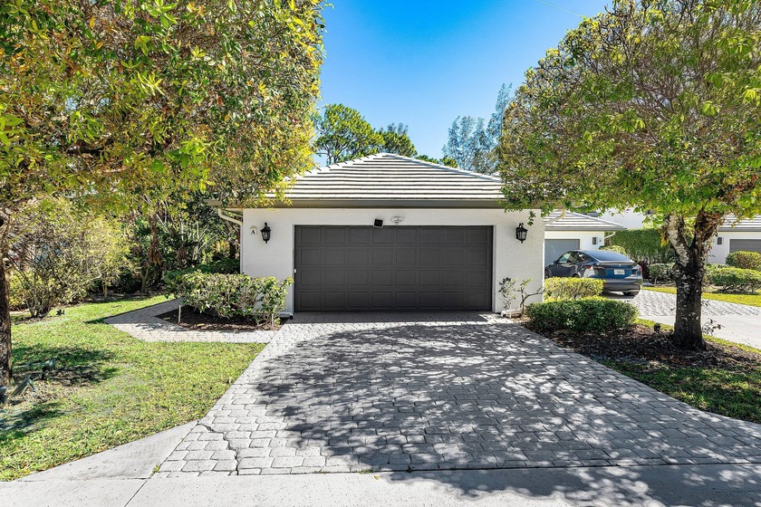 Discover a stunning corner residence designed to offer a true - Beach Townhome/Townhouse for sale in West Palm Beach, Florida on Beachhouse.com
