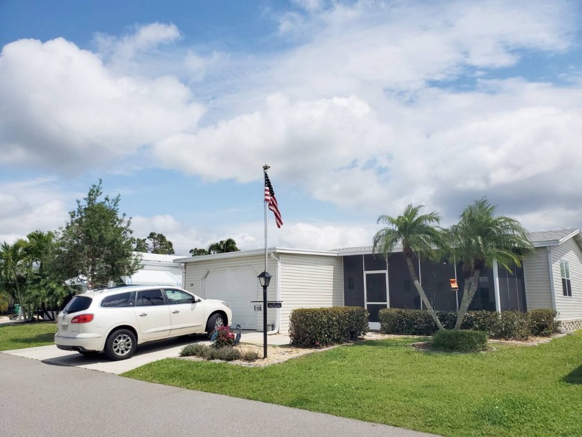 Rare One & Half One Car Garage with a Tandem Car DriveWay! - Beach Home for sale in Punta Gorda, Florida on Beachhouse.com