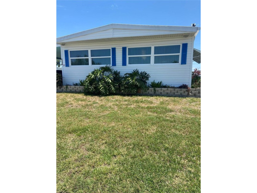 Discover this charming mobile home located at 304 50th Ave Dr W - Beach Home for sale in Bradenton, Florida on Beachhouse.com