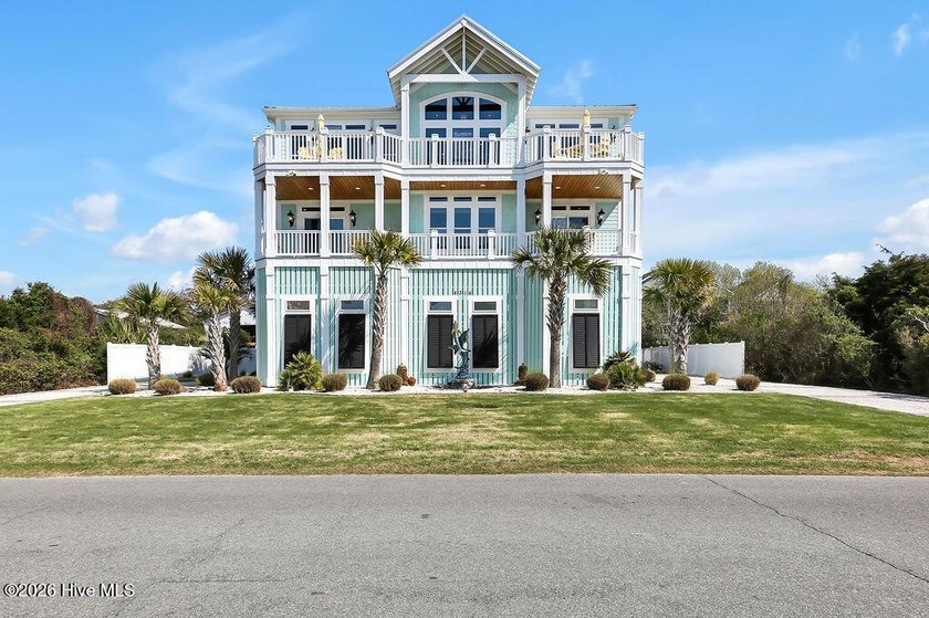 A LOVE STORY LIKE NO OTHER! THE HOME LOCATED AT 4314 E DOLPHIN - Beach Home for sale in Oak Island, North Carolina on Beachhouse.com