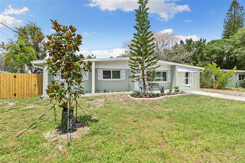 This beautifully updated 4-bedroom, 2-bath home is located in a - Beach Home for sale in Sarasota, Florida on Beachhouse.com