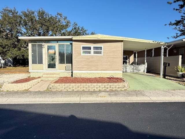 Welcome to this beautifully maintained 3 bed, 2 bath lakefront - Beach Home for sale in Pinellas Park, Florida on Beachhouse.com
