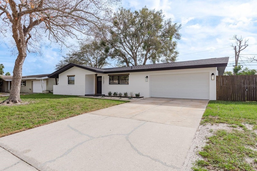 Move-in ready and fully reimagined in 2025, this 4/2 Clearwater - Beach Home for sale in Clearwater, Florida on Beachhouse.com