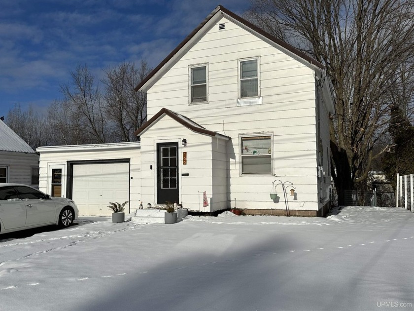 Location, location. This sweet home is close to the shopping - Beach Home for sale in Ironwood, Michigan on Beachhouse.com