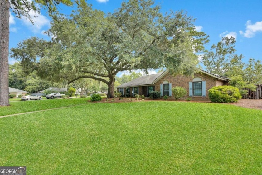 This beautiful brick home is situated on a statement making - Beach Home for sale in Savannah, Georgia on Beachhouse.com