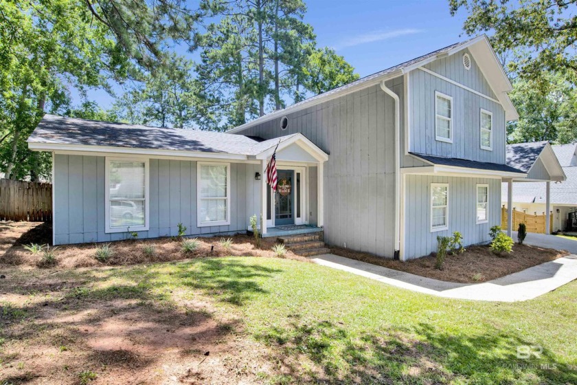 Discover this stunning, updated two-story home nestled in a - Beach Home for sale in Daphne, Alabama on Beachhouse.com