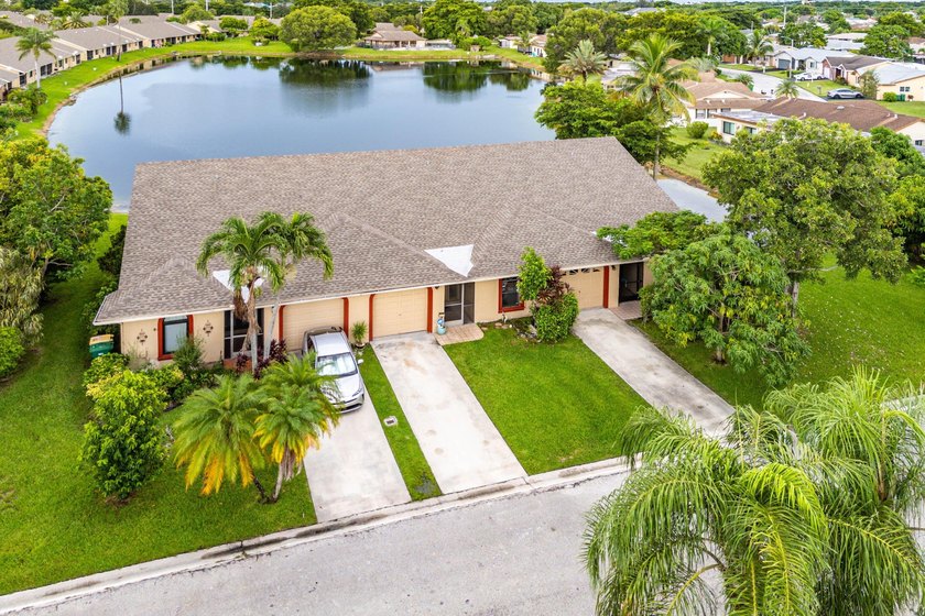 Rise and shine with lake views from every room. Only to end your - Beach Home for sale in Tamarac, Florida on Beachhouse.com