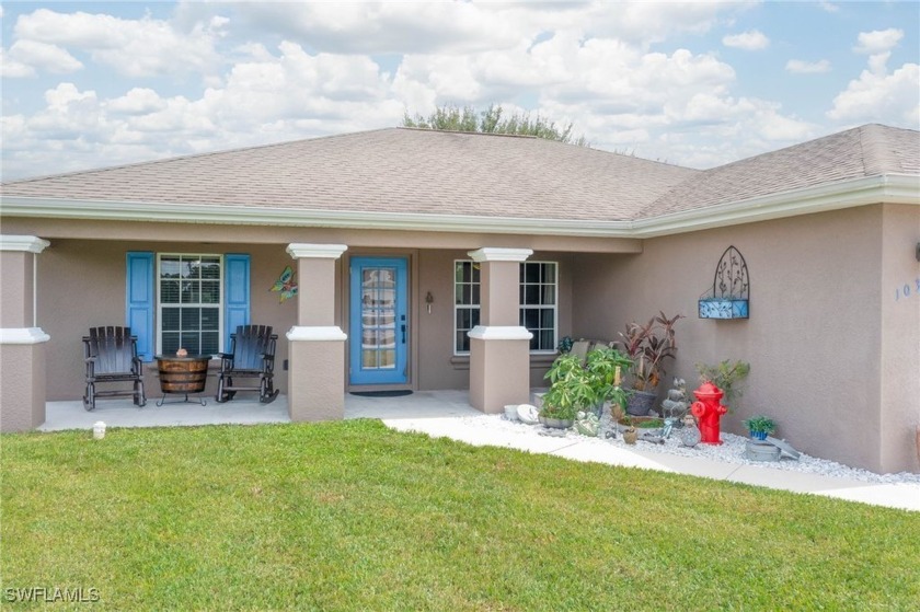 This is a must see, beautiful well priced ranch style home - Beach Home for sale in Lehigh Acres, Florida on Beachhouse.com