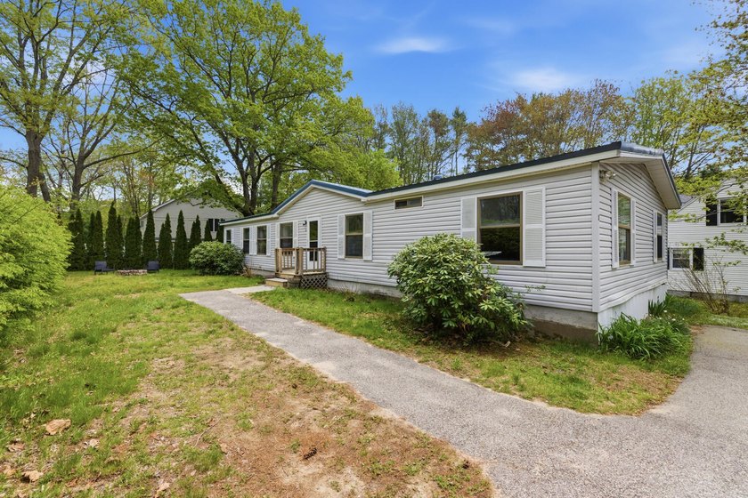 Perfectly positioned on a desirable corner lot, this spacious - Beach Home for sale in Kennebunk, Maine on Beachhouse.com