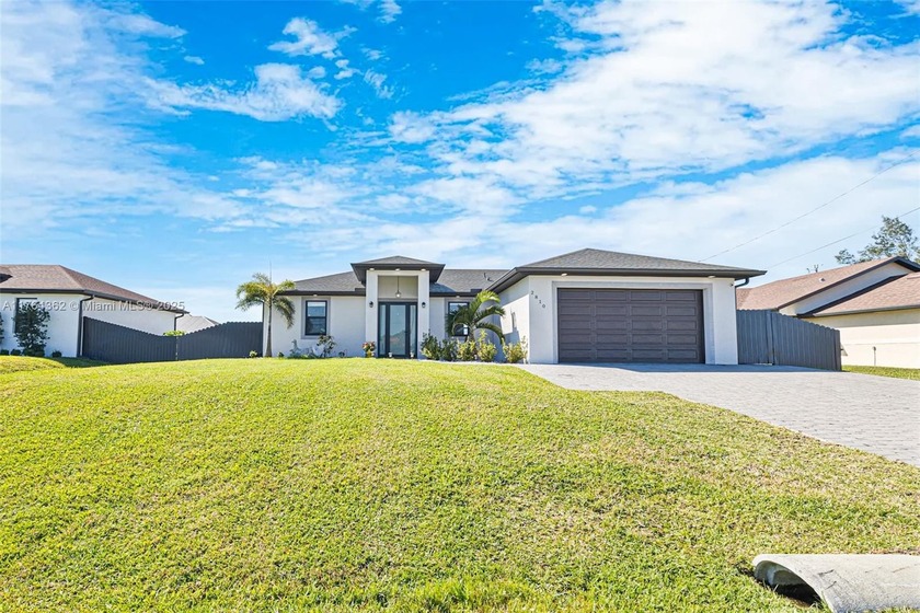 This stunning, newly built residence combines modern design with - Beach Home for sale in Cape Coral, Florida on Beachhouse.com