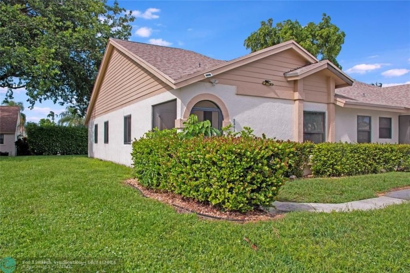 An amazing corner lot unit in Rainberry Bay, a fun and friendly - Beach Home for sale in Delray Beach, Florida on Beachhouse.com