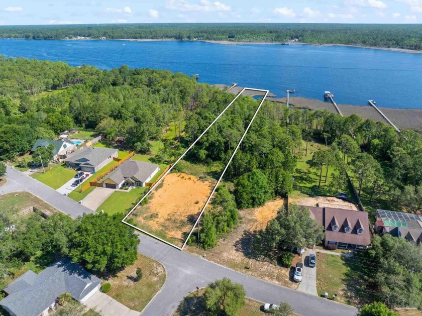 Discover an exceptional opportunity to own 1.8 acres of prime - Beach Lot for sale in Navarre, Florida on Beachhouse.com
