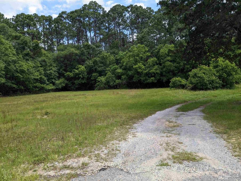 Call your builder - this cleared, 2/3 acre building lot fronts - Beach Lot for sale in Pensacola, Florida on Beachhouse.com