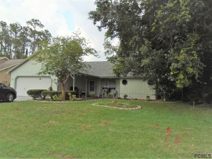 MOTIVATED SELLER!! GREAT PRICE ON THIS POOL HOME IN HIGHLY - Beach Home for sale in Palm Coast, Florida on Beachhouse.com